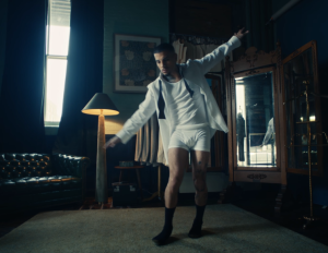 Rauw Alejandro switches to funk in 'Touching The Sky'