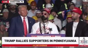 Anuel AA and Justin Quiles hang out with Trump at a rally