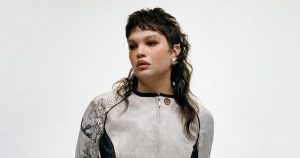 Lola Young clings to number 1 in UK with 'Messy'