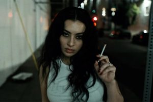 Charli XCX stars in the new music video for 'The Moment'