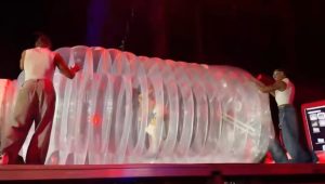 Katy Perry surfs the public inside a bottle in Santiago